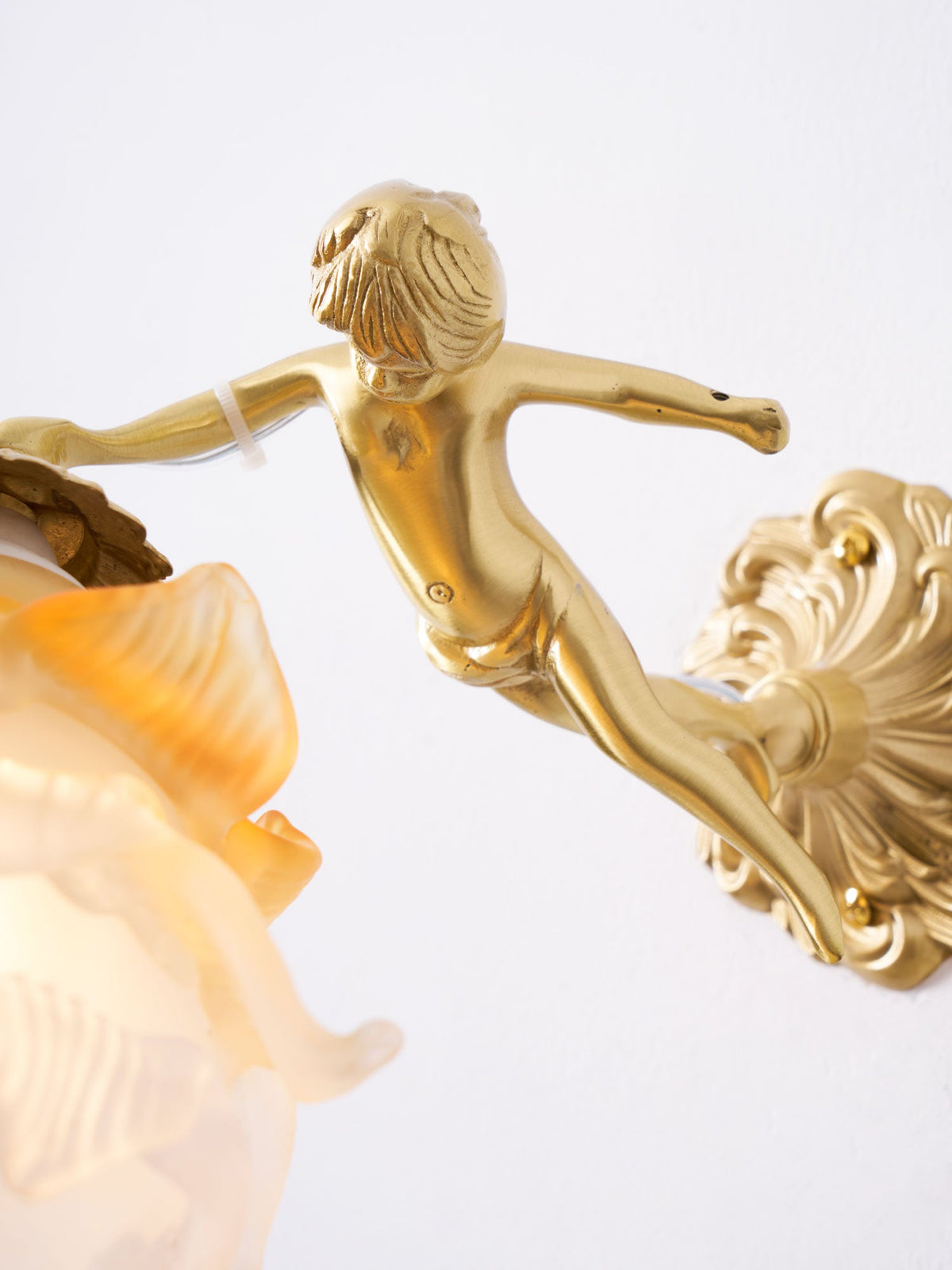 antique-brass-wall-sconce-with-angel-figurine-detail-img18.jpg
