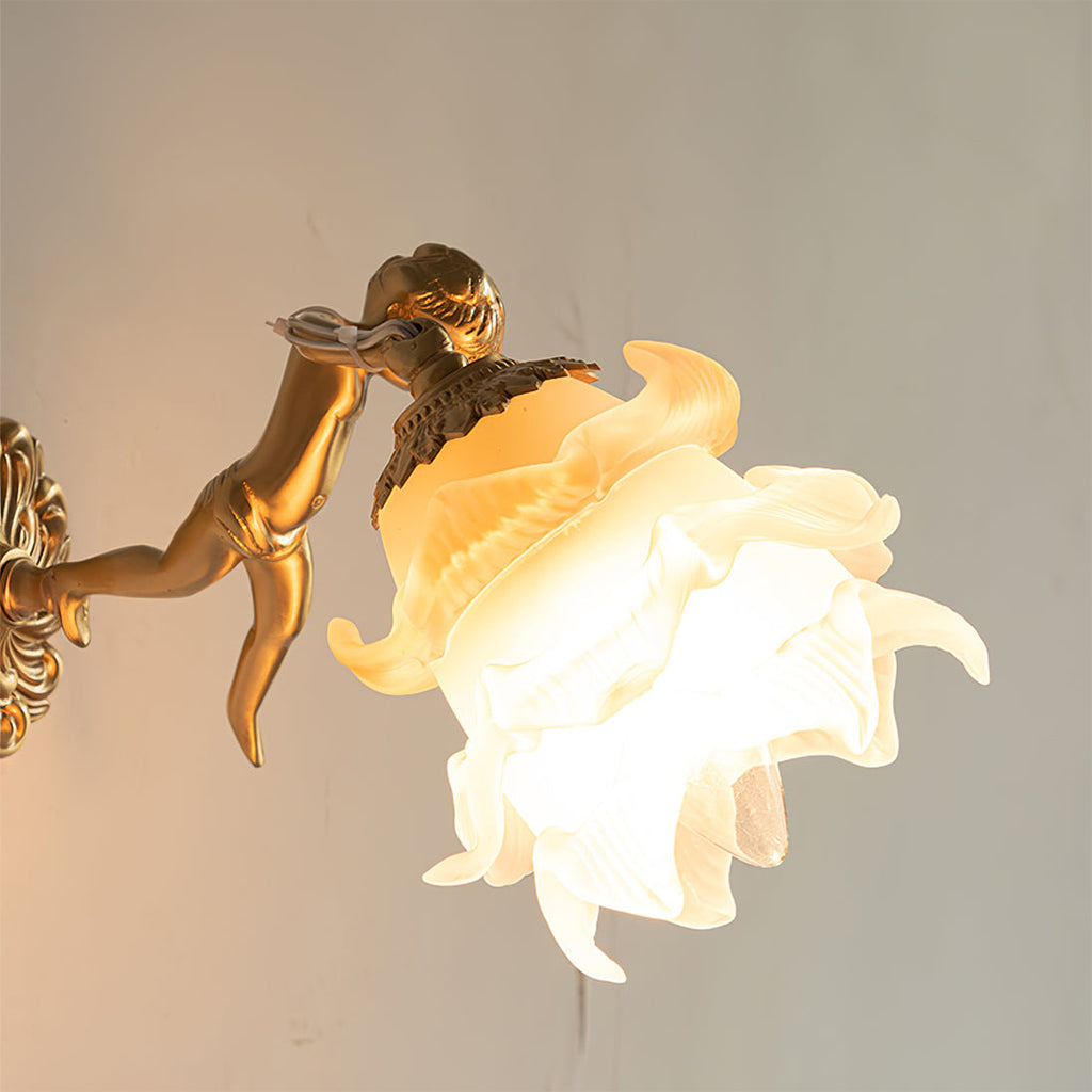 antique-brass-wall-sconce-with-angel-figurine-detail-img3.jpg