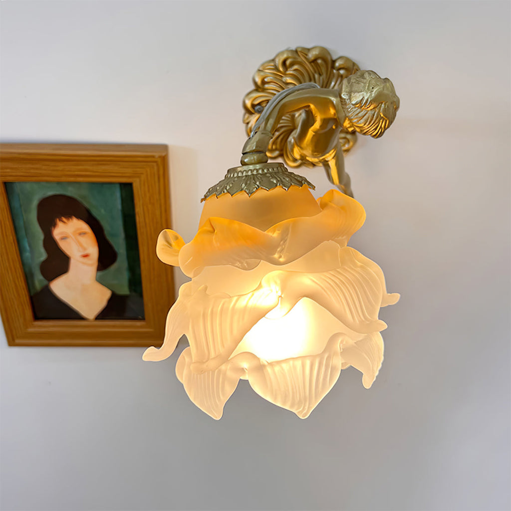 antique-brass-wall-sconce-with-angel-figurine-detail-img4.jpg