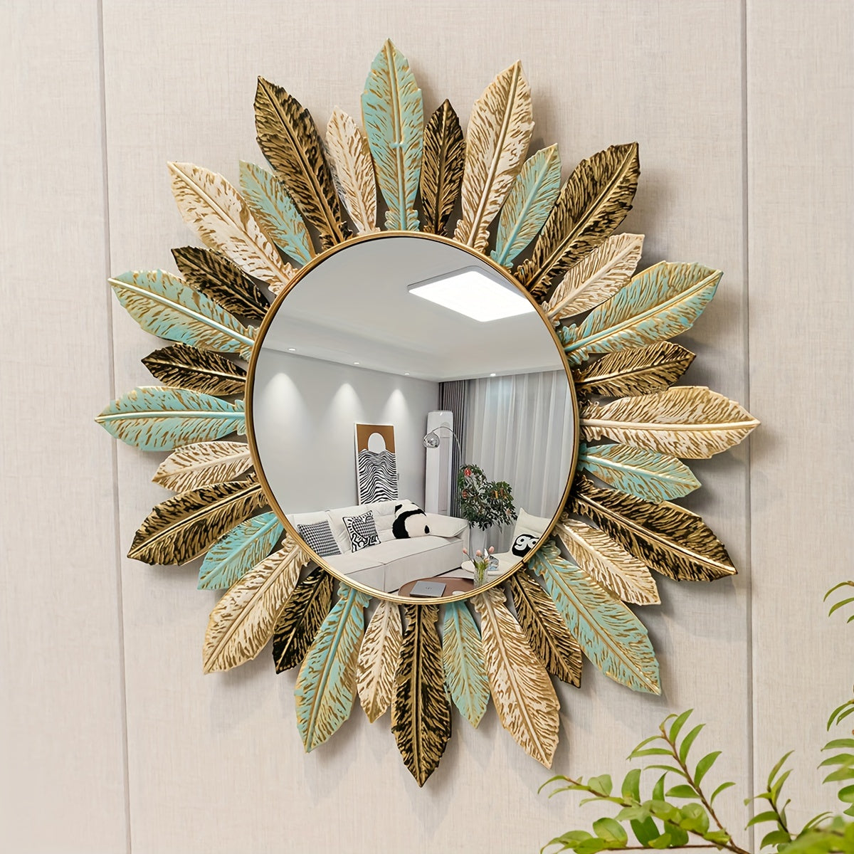 bohemian-sunburst-metal-wall-mirror-with-teal-gold-leaf-detail-img1.jpg