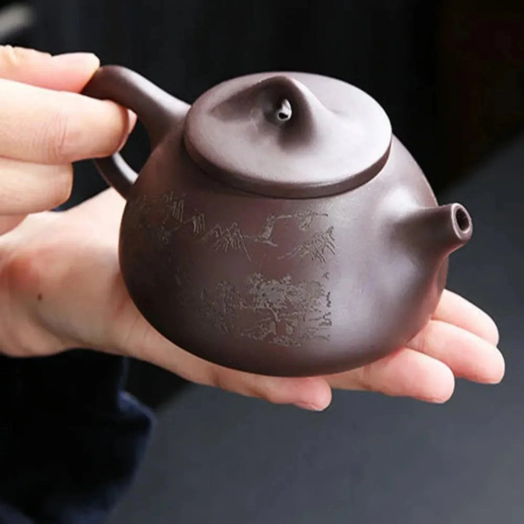 handcrafted-purple-clay-tea-set-with-calligraphic-accents-img6.webp
