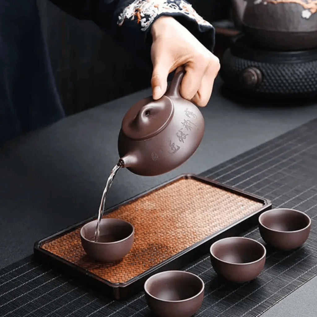 handcrafted-purple-clay-tea-set-with-calligraphic-accents-img8.png