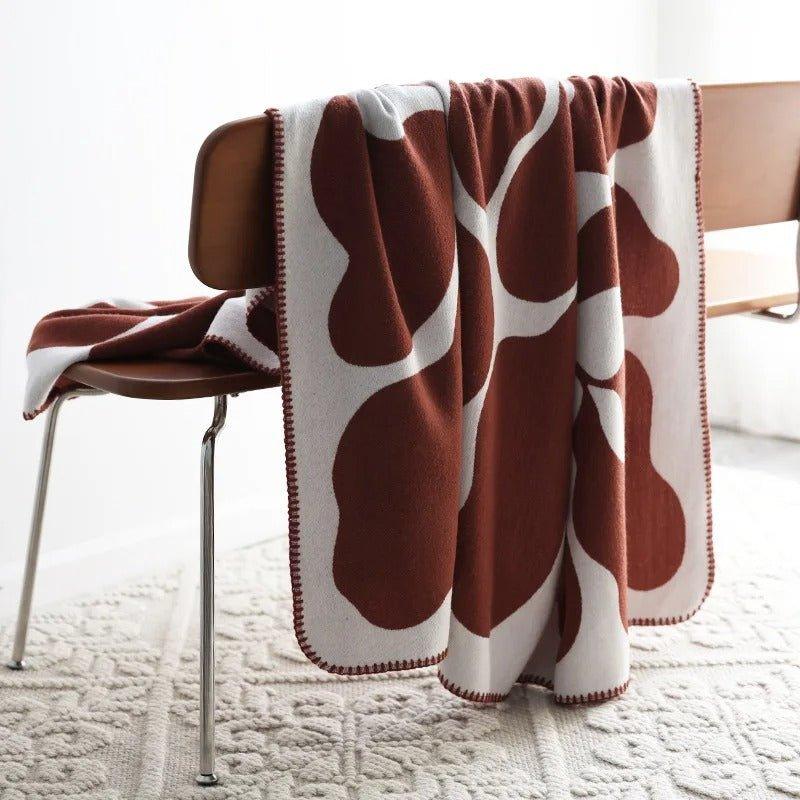 luxe-bohemian-throw-blanket-with-modern-abstract-design-img1.jpg