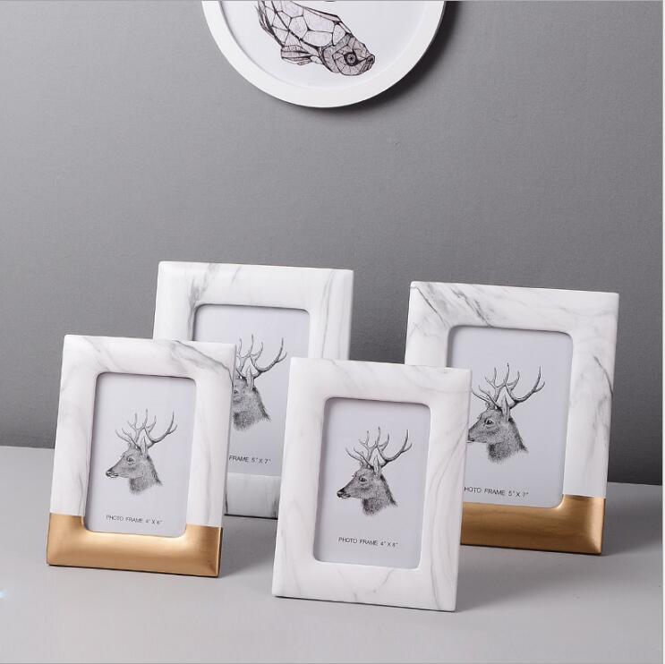 marble-look-photo-frame-with-gold-accent-base-img1.jpg