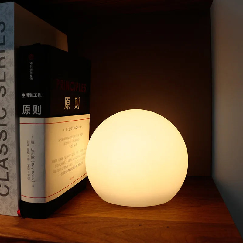 modern-globe-table-lamp-with-elegant-warm-glow-img2.webp