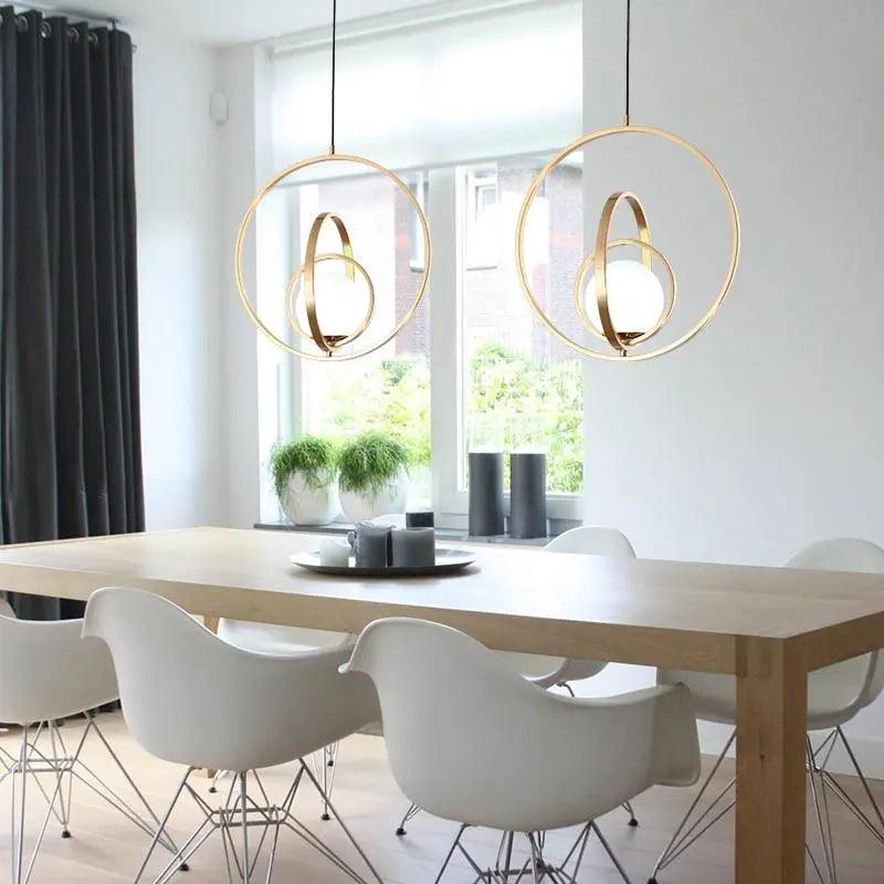 modern-rotating-gold-pendant-light-for-kitchen-island-img4.jpg