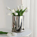 molten-silver-resin-vase-with-fluid-metallic-form-img2.webp