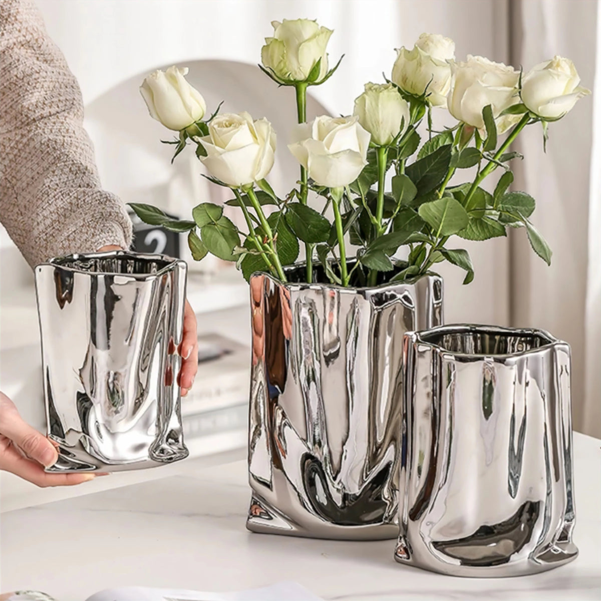 molten-silver-resin-vase-with-fluid-metallic-form-img4.webp