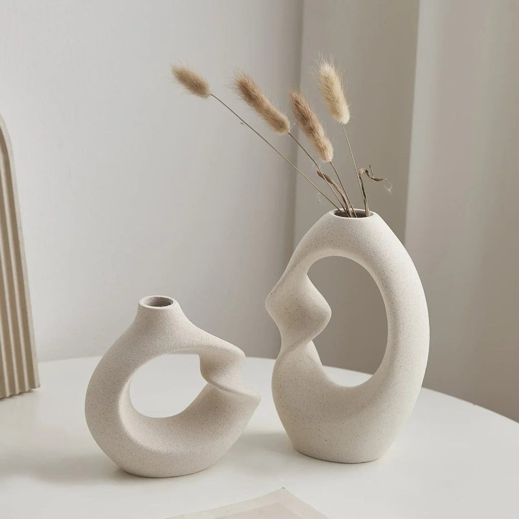 sculpted-ceramic-vase-set-with-abstract-curved-design-img4.webp