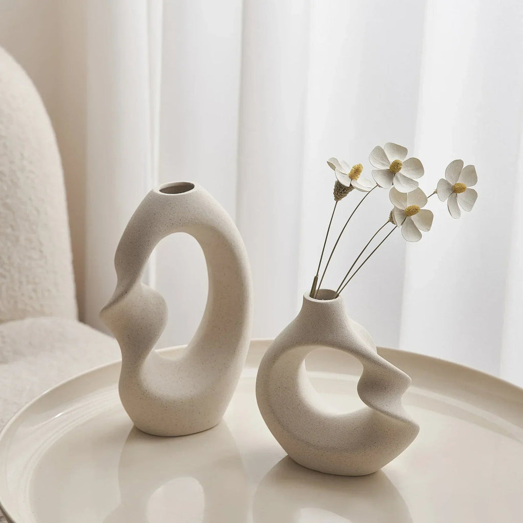 sculpted-ceramic-vase-set-with-abstract-curved-design-img6.webp