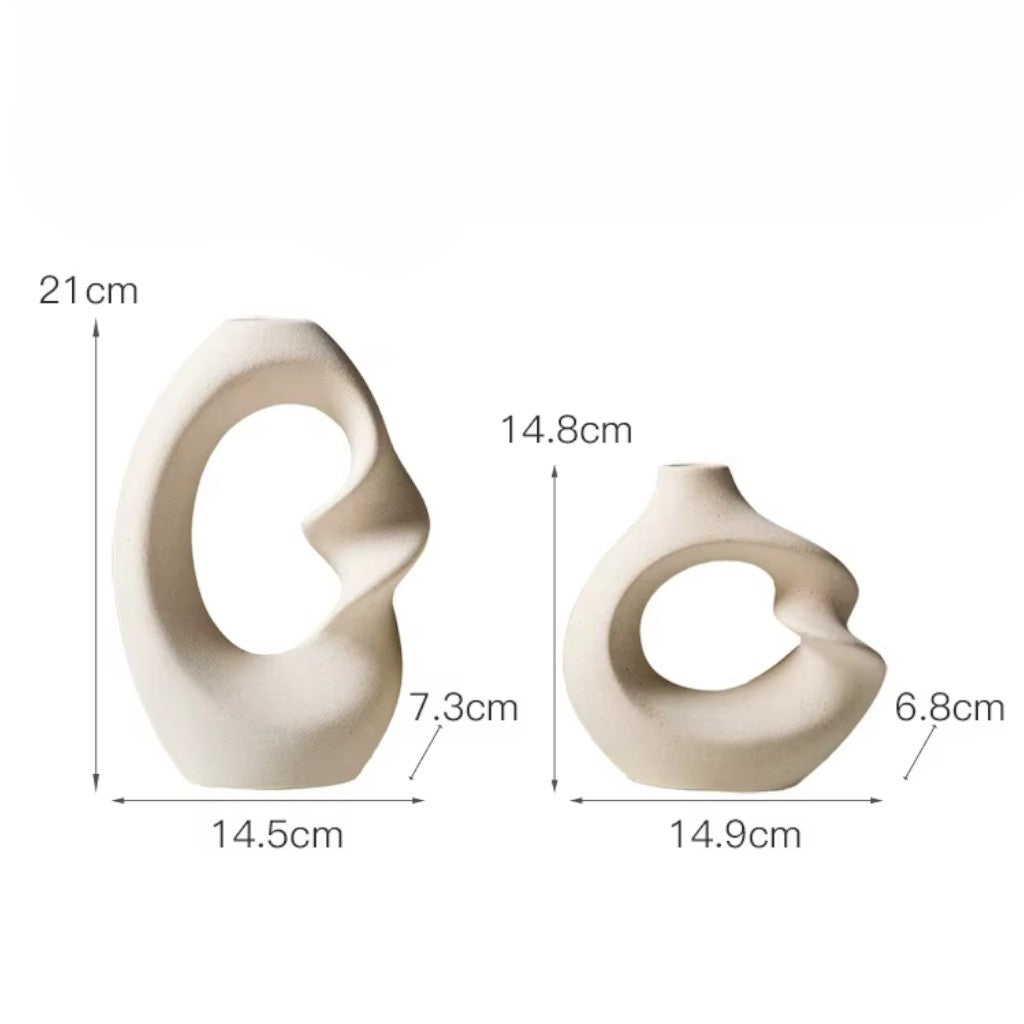 sculpted-ceramic-vase-set-with-abstract-curved-design-img7.jpg
