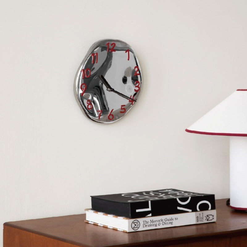 sculpted-ceramic-wall-clock-with-chrome-electroplated-finish-img12.jpg