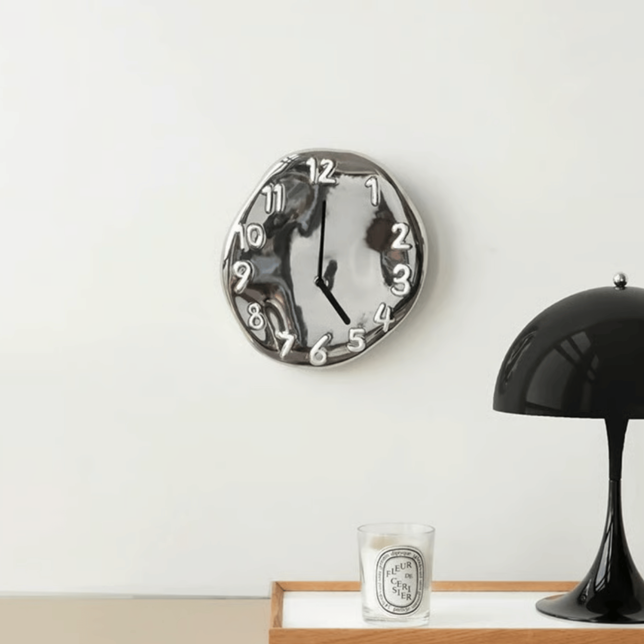 sculpted-ceramic-wall-clock-with-chrome-electroplated-finish-img4.png