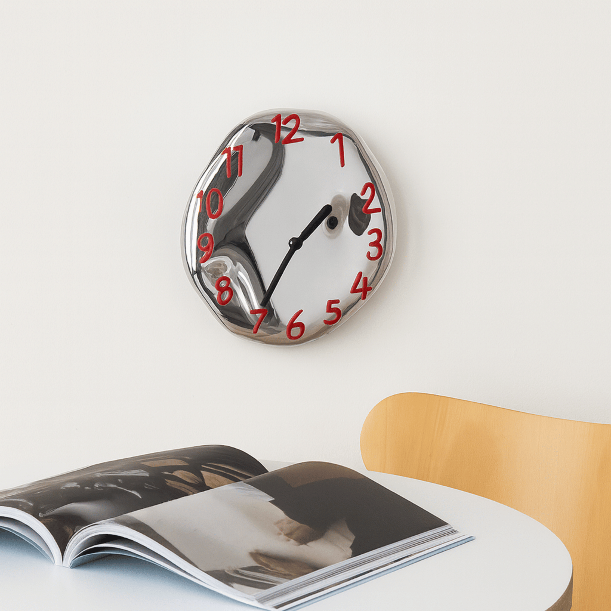sculpted-ceramic-wall-clock-with-chrome-electroplated-finish-img7.png