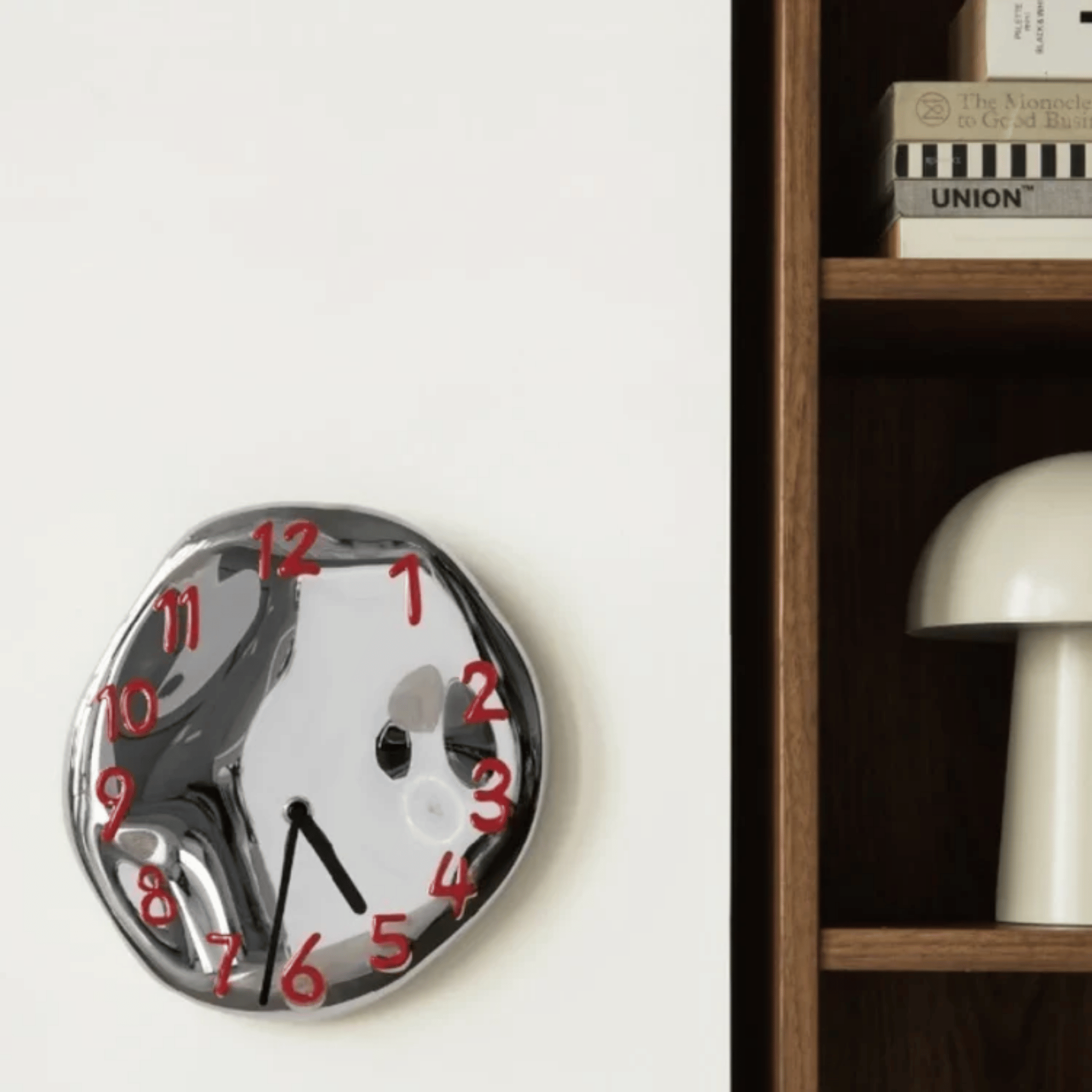 sculpted-ceramic-wall-clock-with-chrome-electroplated-finish-img9.png