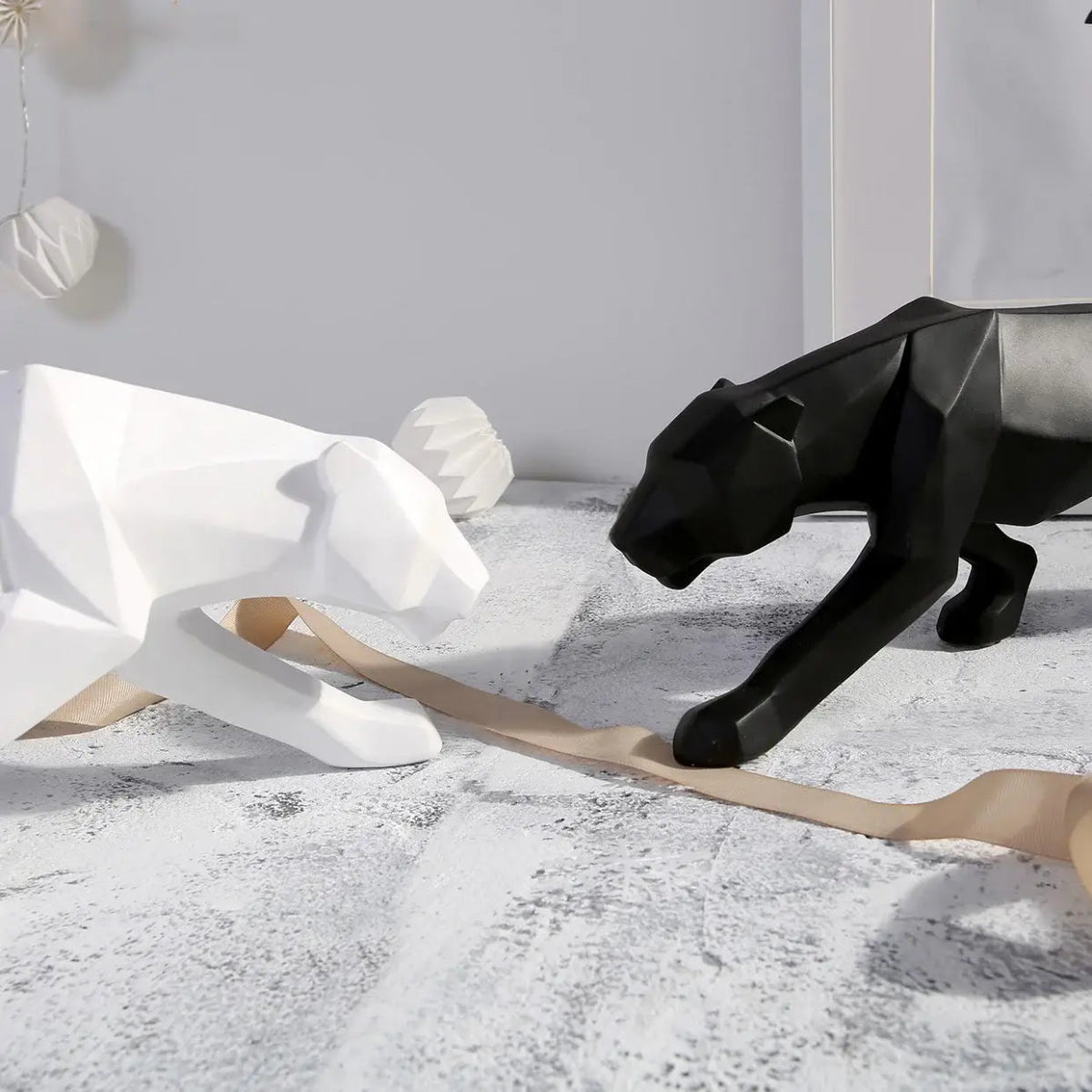 sleek-abstract-panther-resin-sculpture-img2.webp